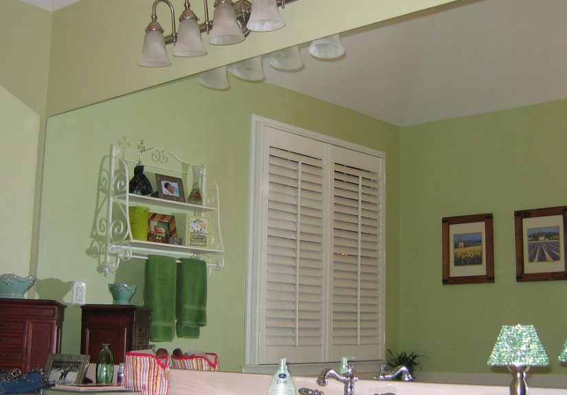 How to Make a Large Bathroom Mirror Look Designer