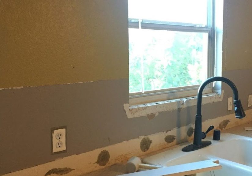 Builder Basic Kitchen Upgrade with Brick Paneling