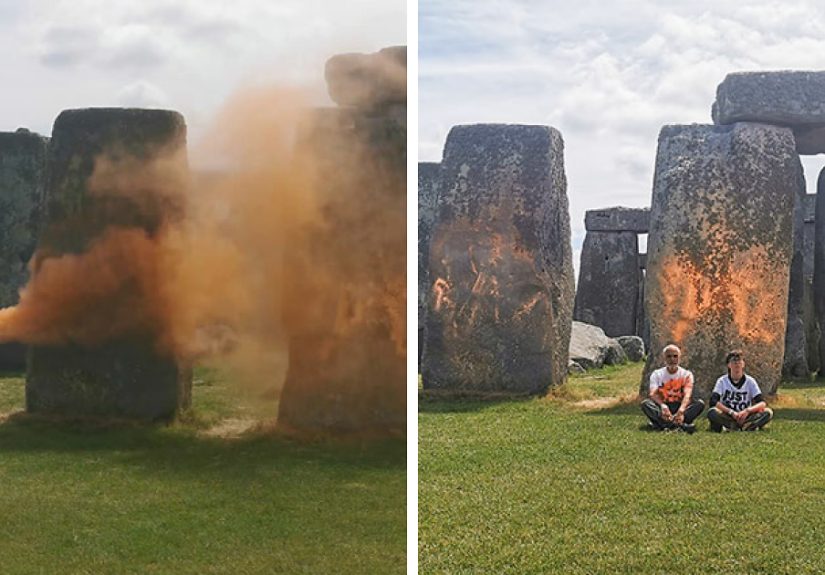 Stonehenge Spray-Painted Orange In Broad Daylight As Onlookers Try To Hold Back Vandals